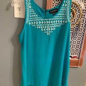 Turquoise colored blouse